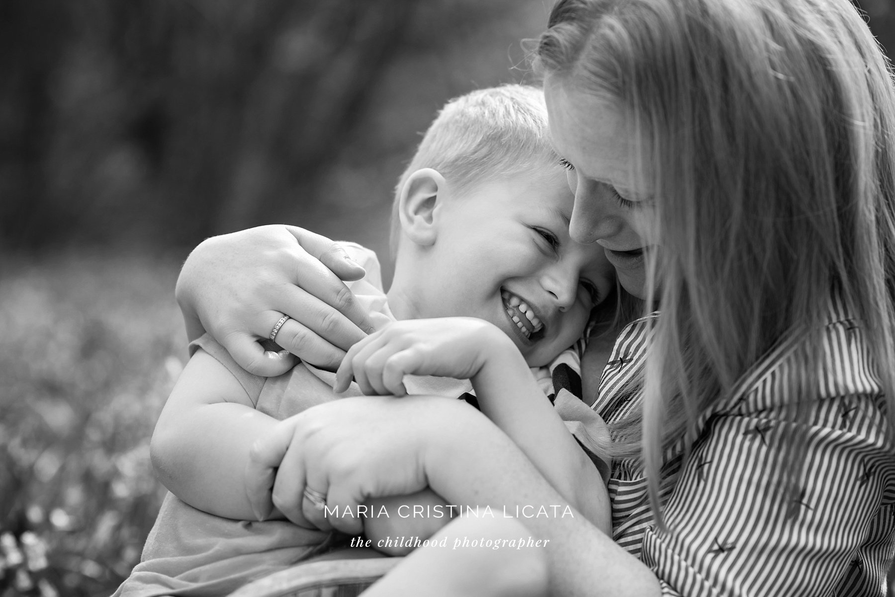 Family spring portraits <br />in the bluebells near Winchester