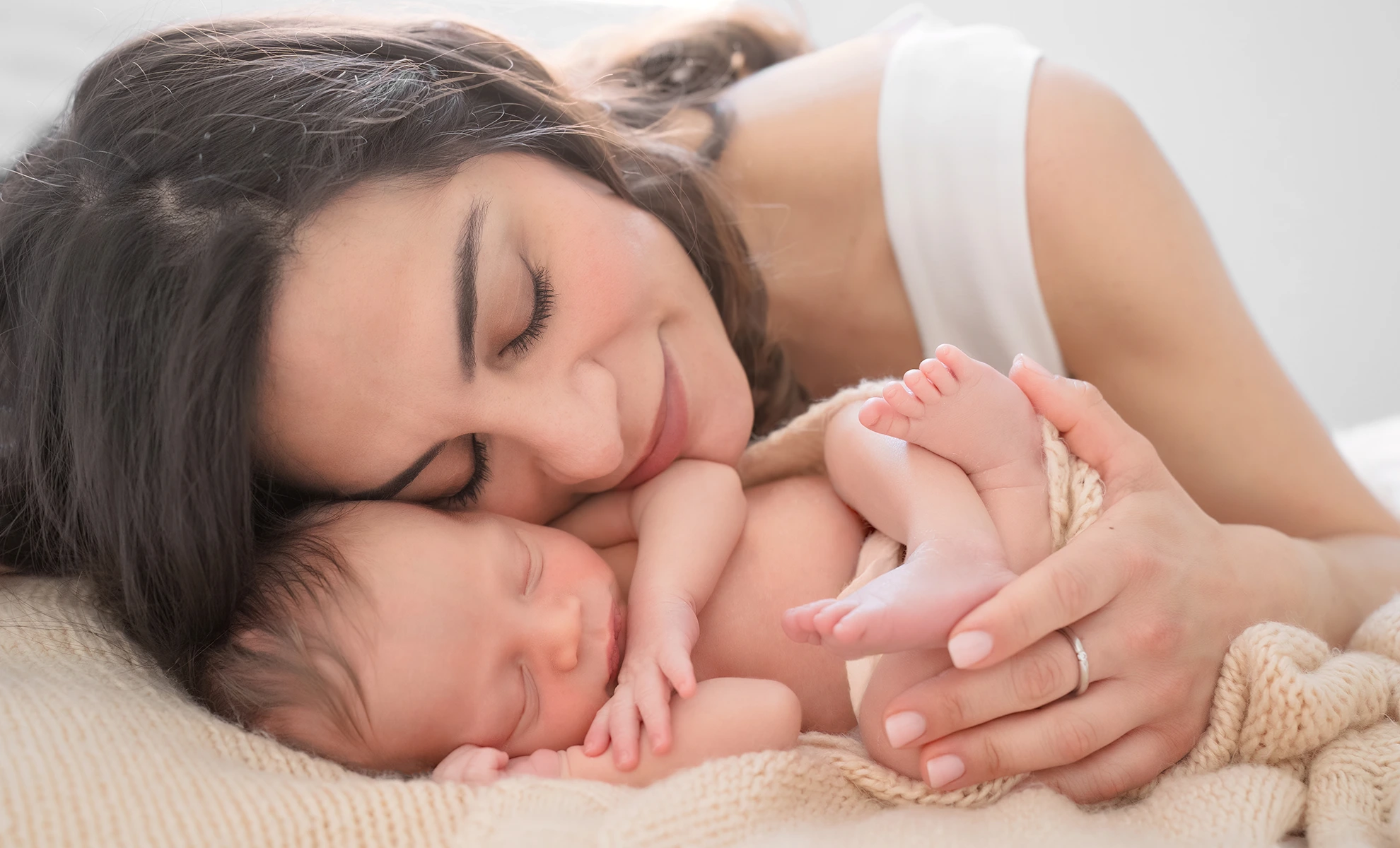 newborn_photography Natural newborn photography session in London showing peaceful sleeping baby