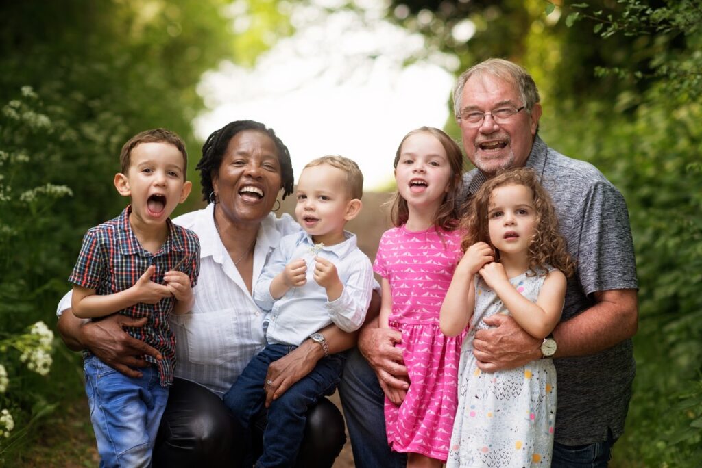 grandparents with grandchildren laughing