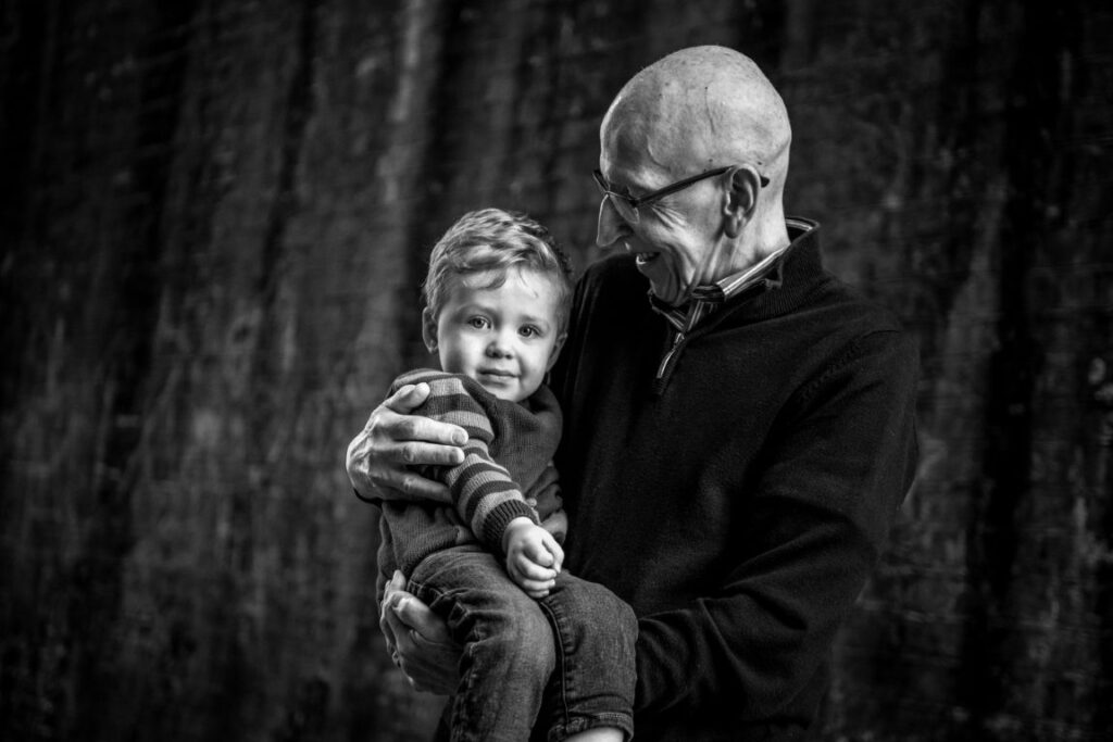 grandad holding grandson