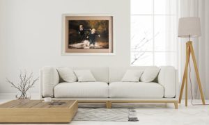 a framed portrait of two boys chasing each other, hanging in a light and bright living room