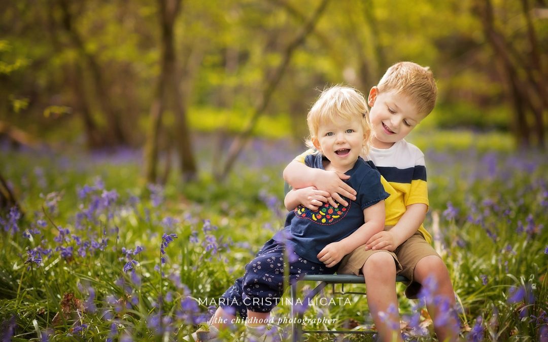 Family spring portraits in the bluebells near Winchester