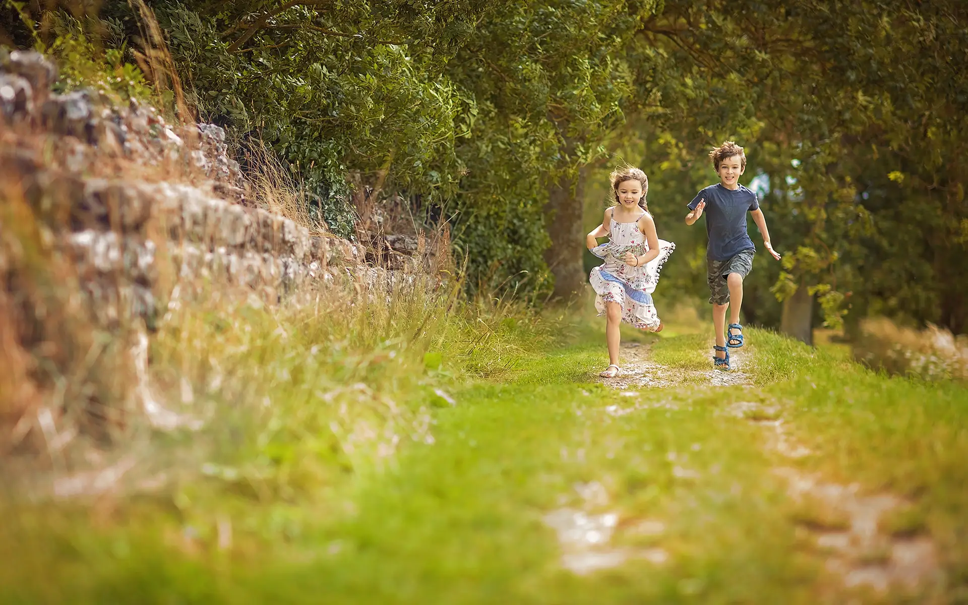 family portrait of mother and toddler son, captured in a park in Berkshire